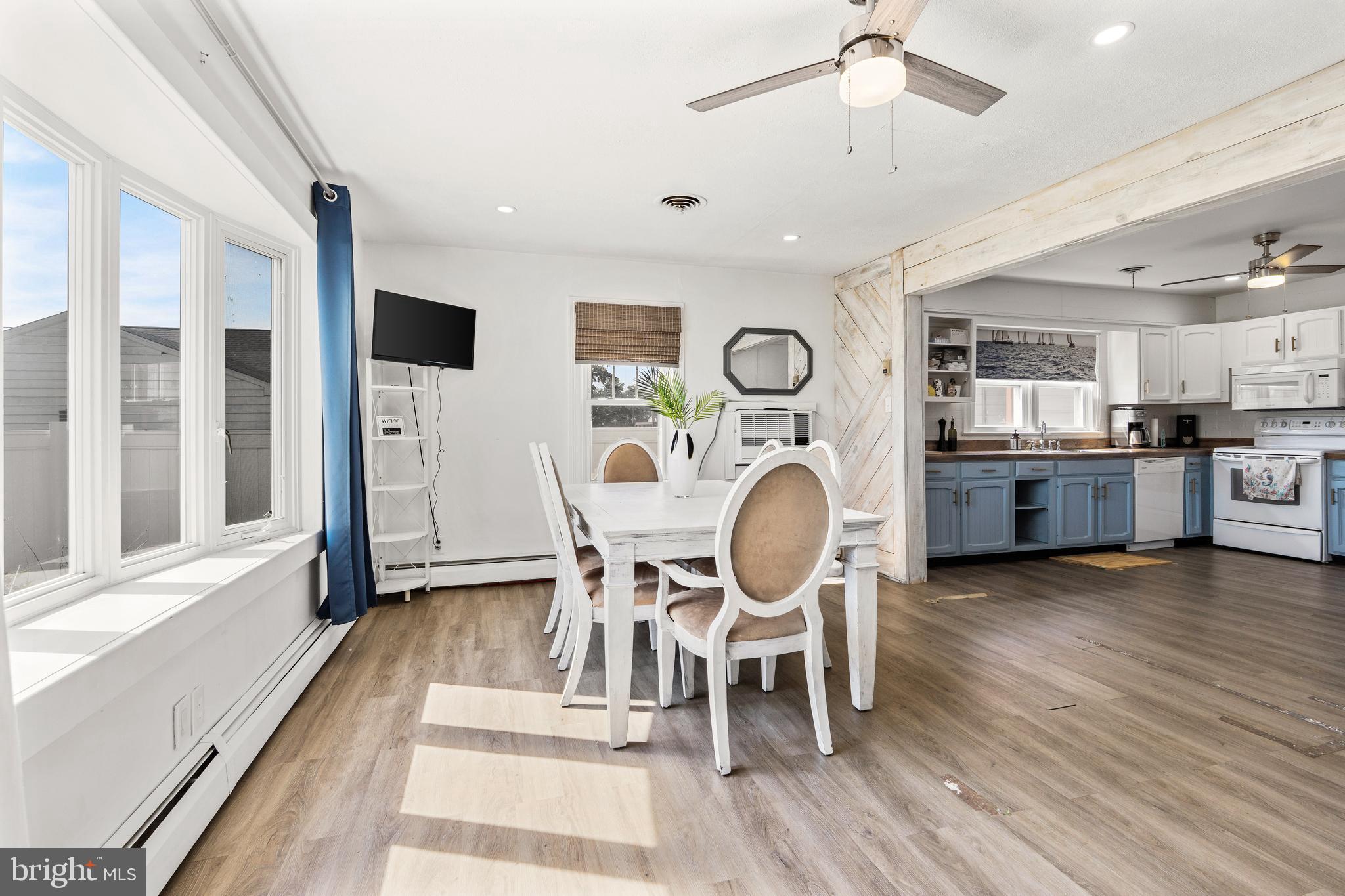 1123 Ball Park Road Fishing Creek, MD 21634 - Photo 11 of 39 a dining room with furniture and wooden floor
