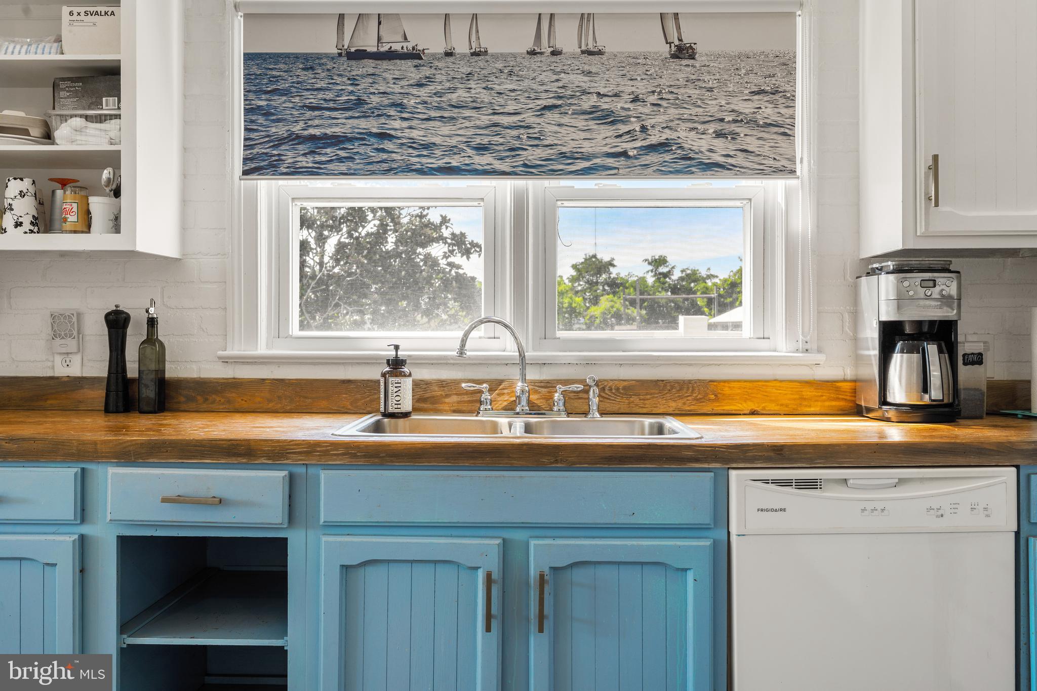 1123 Ball Park Road Fishing Creek, MD 21634 - Photo 15 of 39 a kitchen with a sink and a window