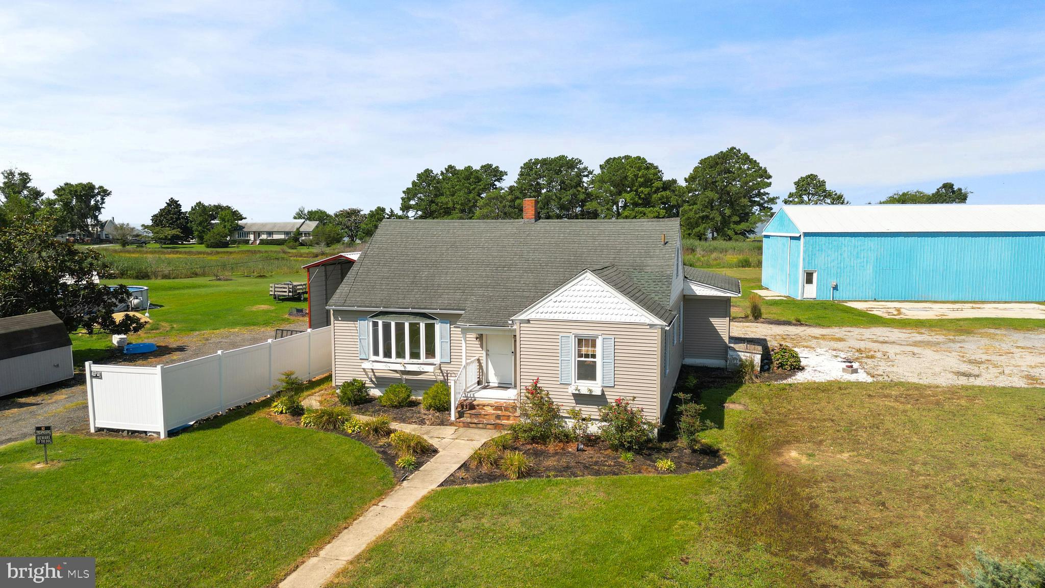 1123 Ball Park Road Fishing Creek, MD 21634 - Photo 2 of 39 a view of a house with a yard