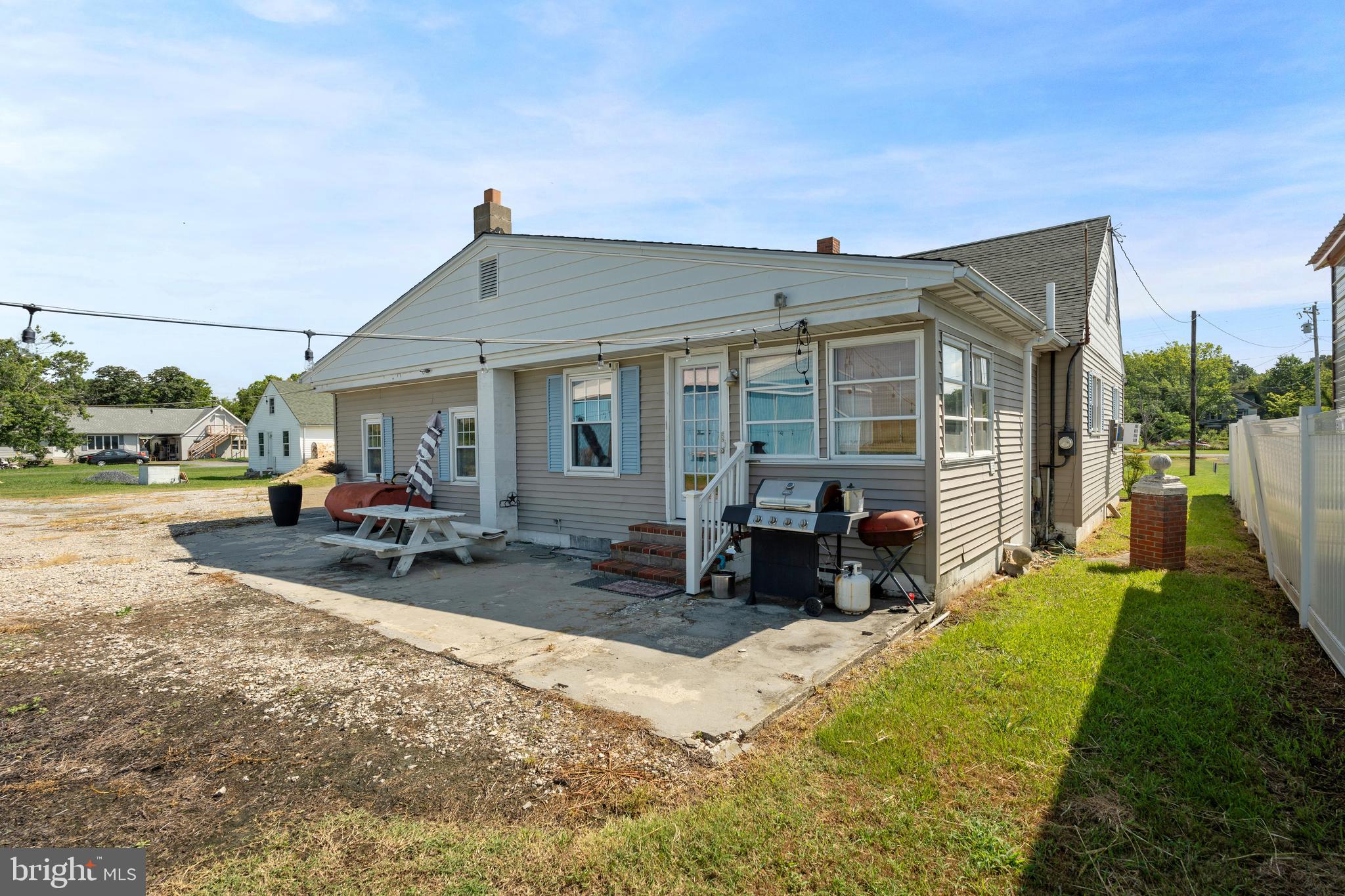 1123 Ball Park Road Fishing Creek, MD 21634 - Photo 36 of 39 a view of a house with backyard porch and sitting area