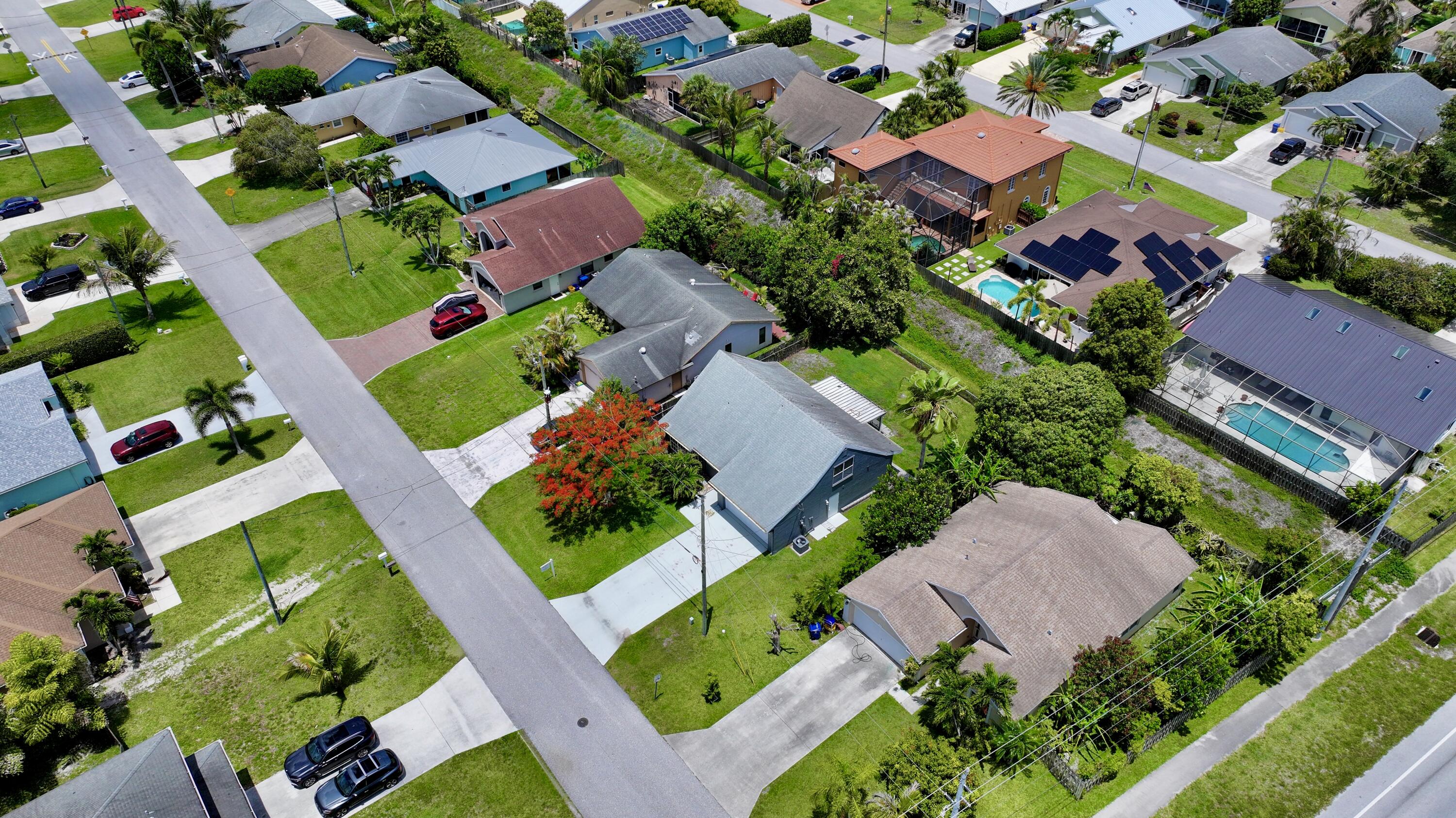 6048 Garrett Street Jupiter, FL 33458 - Photo 87 of 101 dji_fly_20260522_124936_0943_17794719009