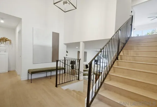a view of staircase with lots of white walls