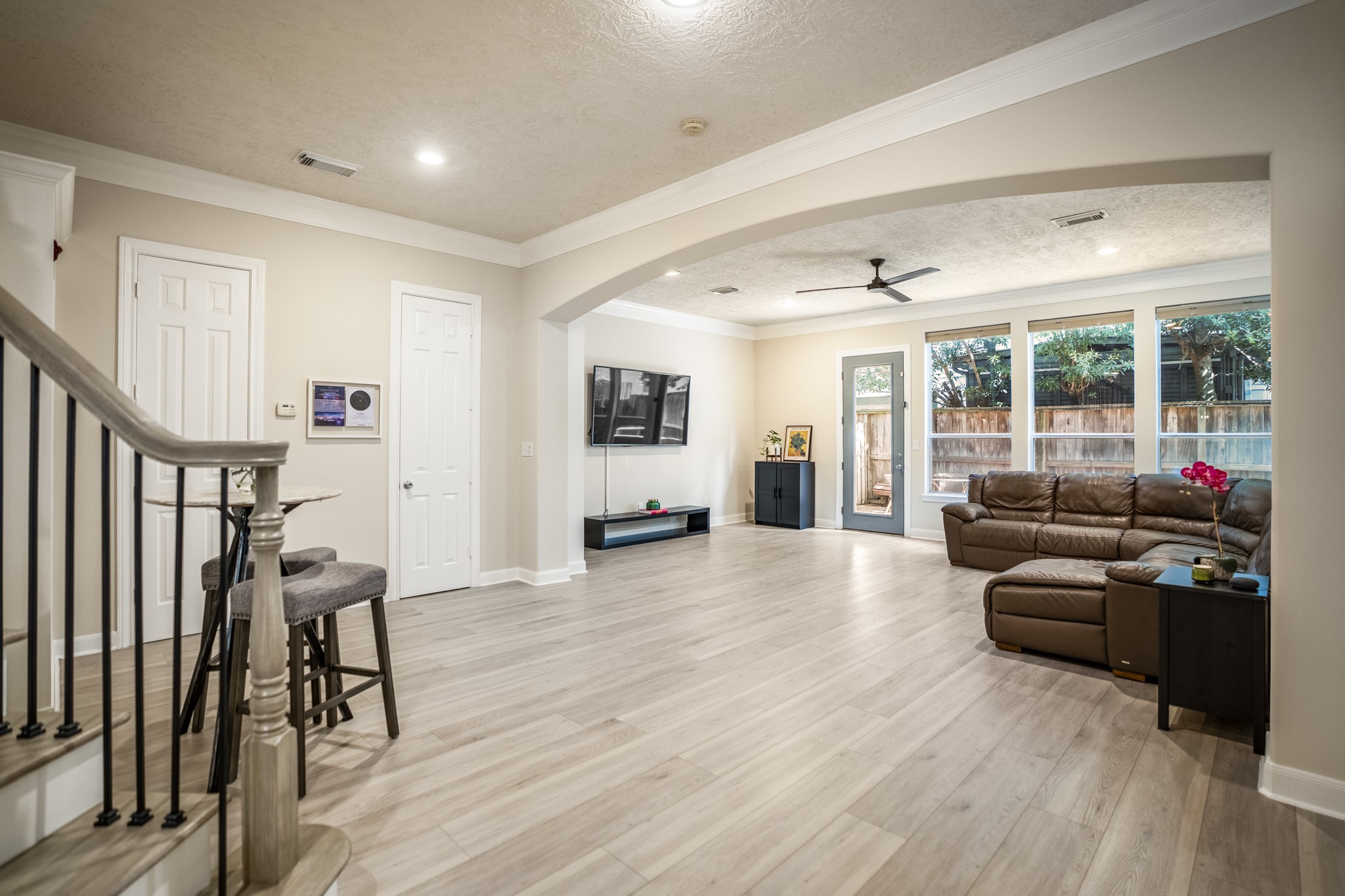 4236 Drake Street Houston, TX 77005 - Photo 8 of 43 Angle showing the expansive living room overlooking the dining area.