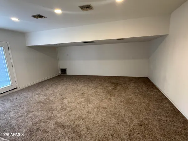 an empty room with a workbench