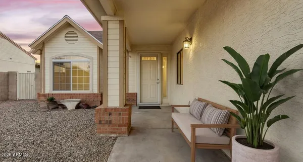 a view of hall way with furniture