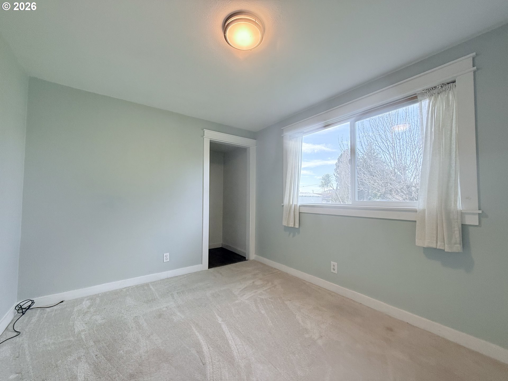 370 North Wall Street Coos Bay, OR 97420 - Photo 27 of 36 a view of an empty room with a window