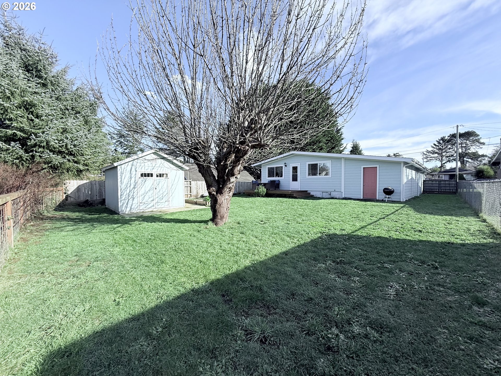 370 North Wall Street Coos Bay, OR 97420 - Photo 30 of 36 a view of house with backyard