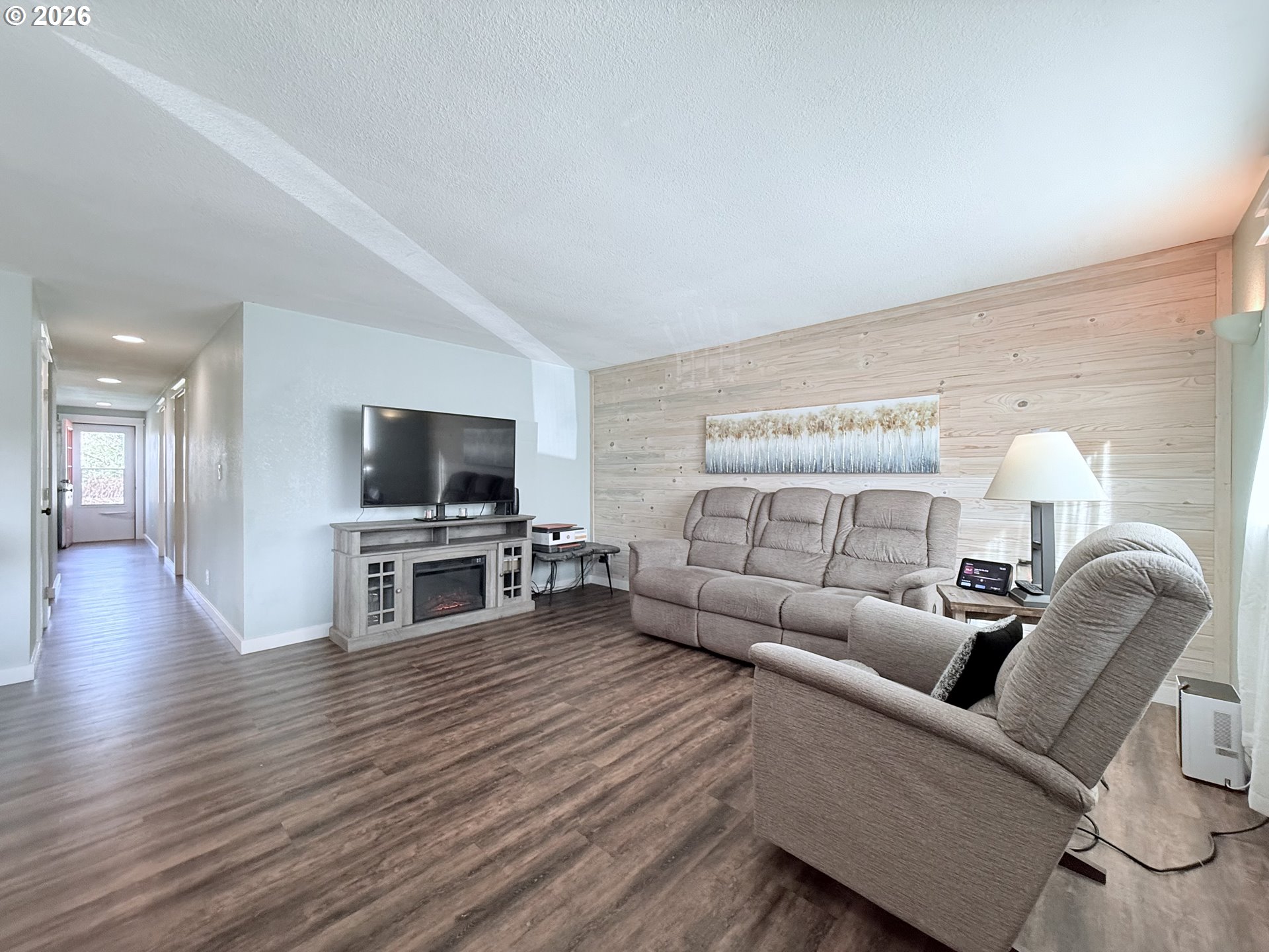 370 North Wall Street Coos Bay, OR 97420 - Photo 8 of 36 a living room with furniture and a flat screen tv