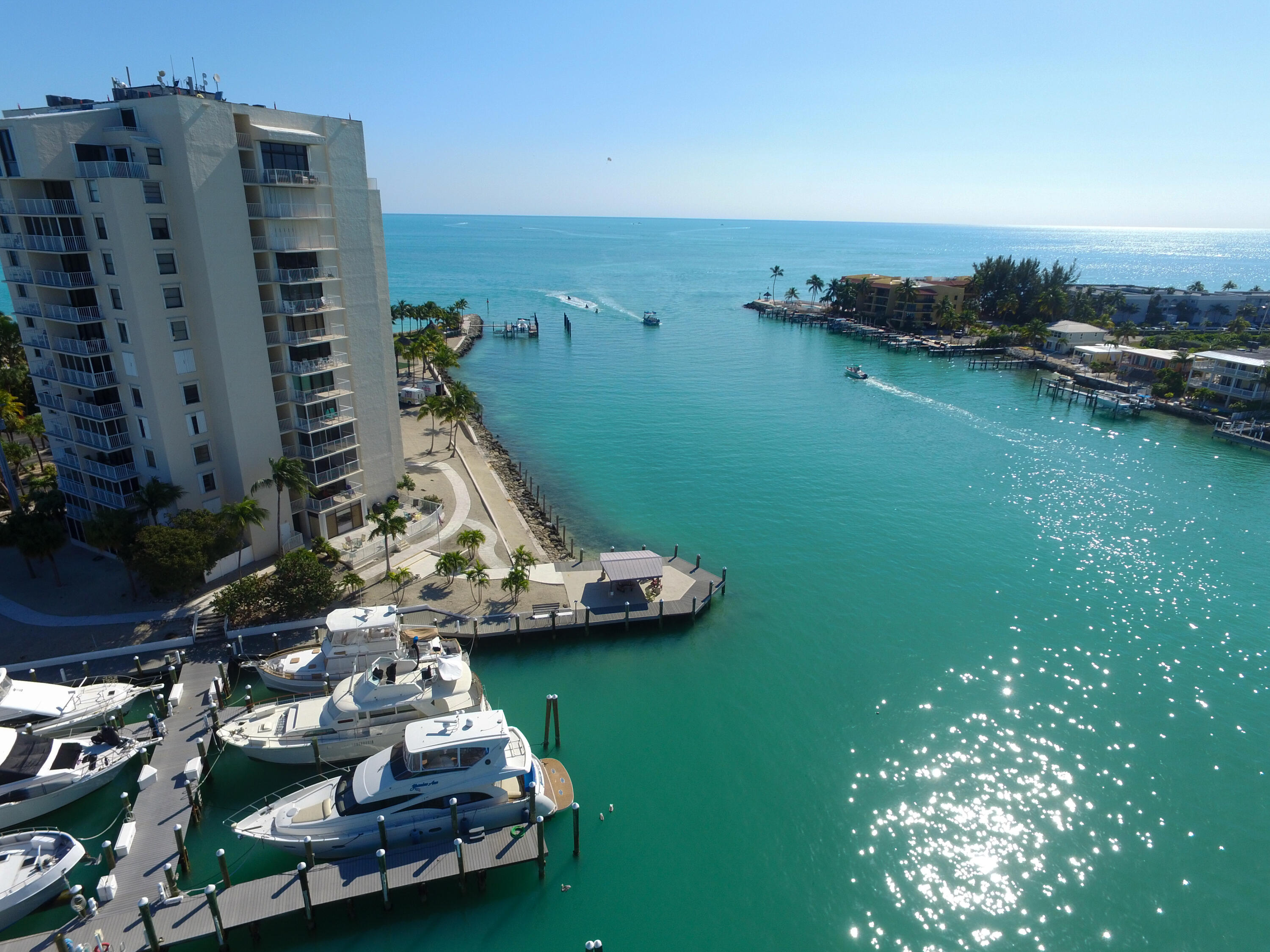 97 Coco Plum Drive, Unit T7 Marathon, FL 33050 - Photo 11 of 24 an aerial view of a house with a garden and lake view