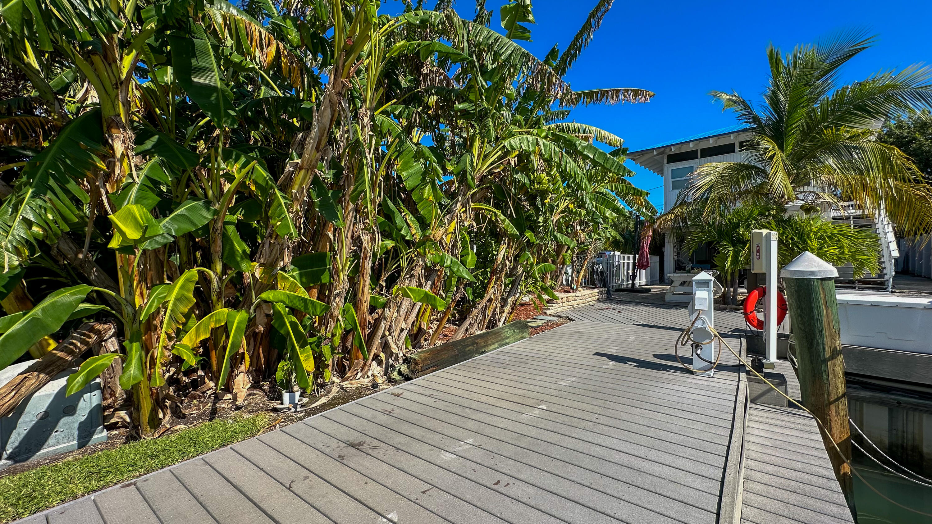97 Coco Plum Drive, Unit T7 Marathon, FL 33050 - Photo 19 of 24 a view of outdoor space with sitting area