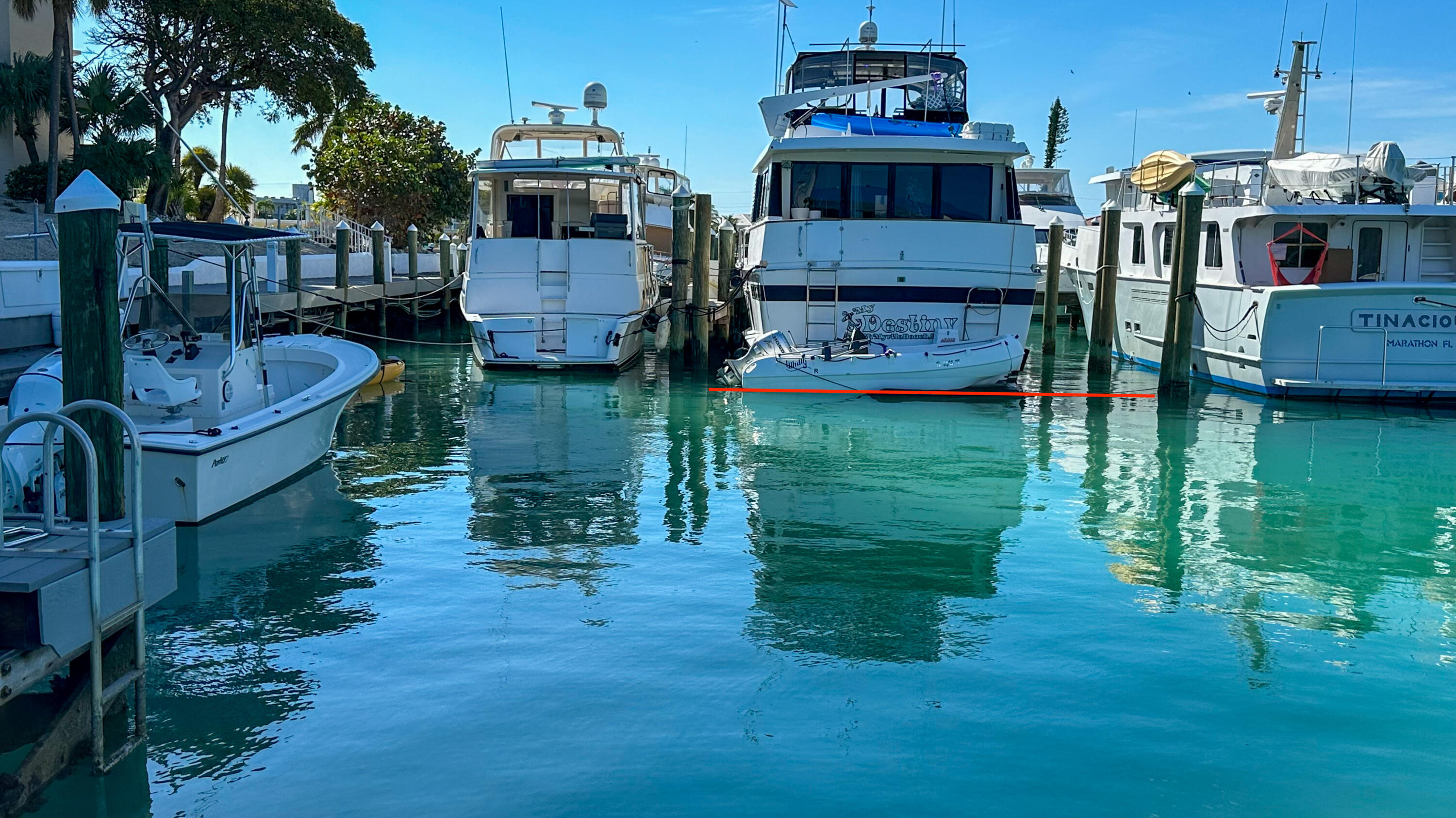 97 Coco Plum Drive, Unit T7 Marathon, FL 33050 - Photo 6 of 24 a front view of house with yard and seating area