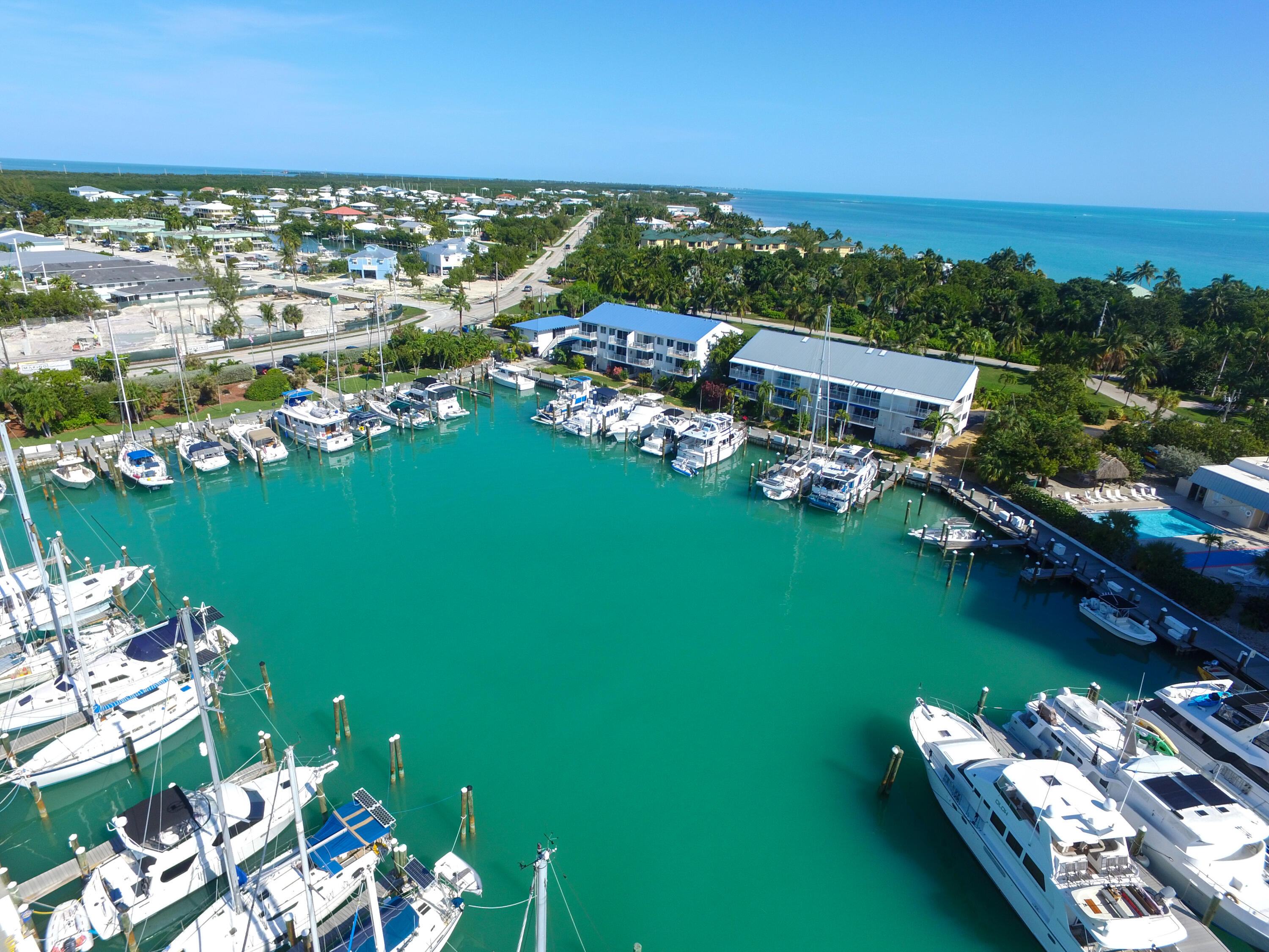 97 Coco Plum Drive, Unit T7 Marathon, FL 33050 - Photo 10 of 24 a view of a city with lawn chairs