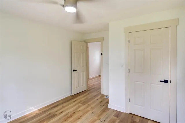 a view of an empty room and window