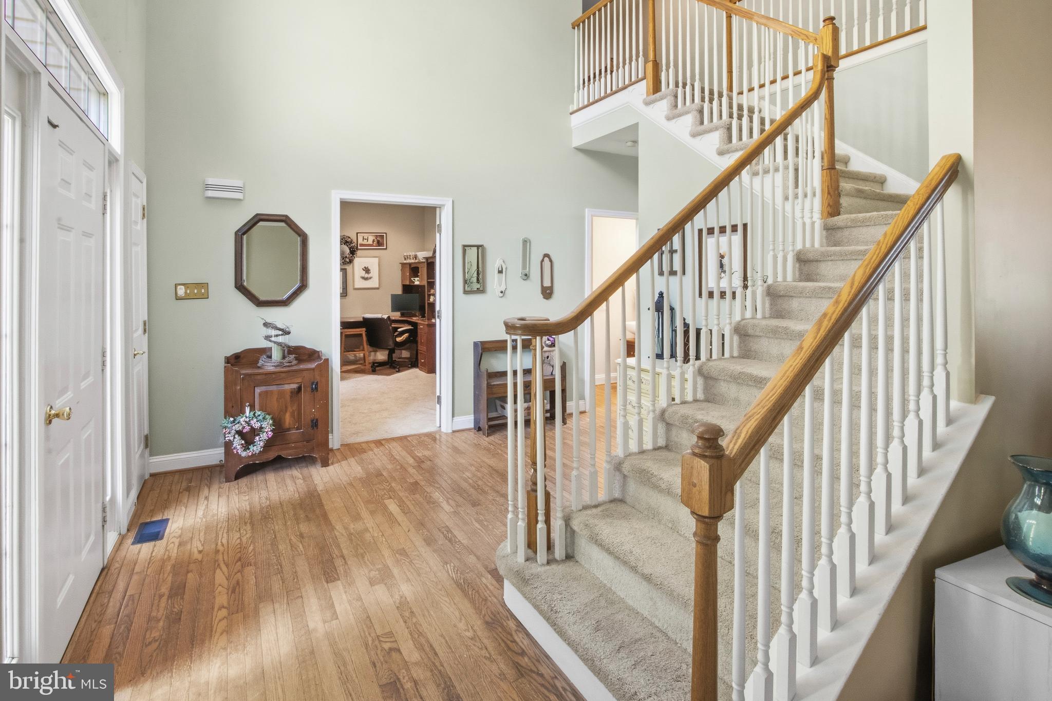 15 Hollybrook Road Mullica Hill, NJ 08062 - Photo 7 of 38 a view of a livingroom with wooden floor and furniture