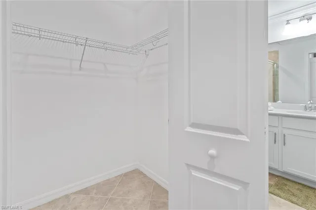 a view of an empty walk in closet