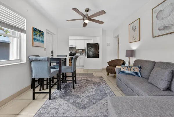 a kitchen with a stove and a refrigerator