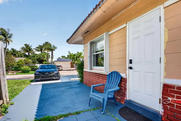 a view of a lake with houses in the back