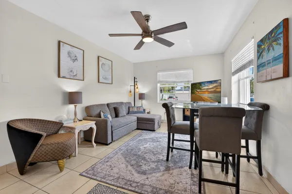 a work room with furniture and windows