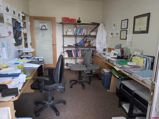 a view of balcony with furniture and garden