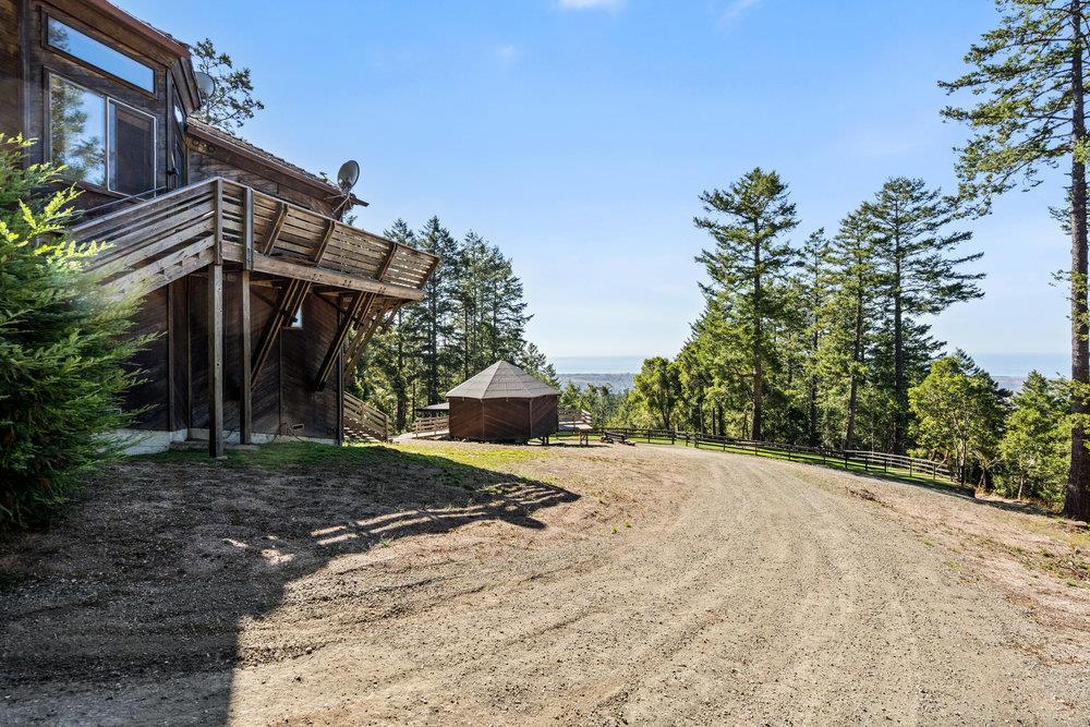 200 South Ranch Road Pescadero, CA 94060 - Photo 59 of 72 a view of a house with a yard
