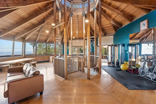 a view of a patio with swimming pool table and chairs