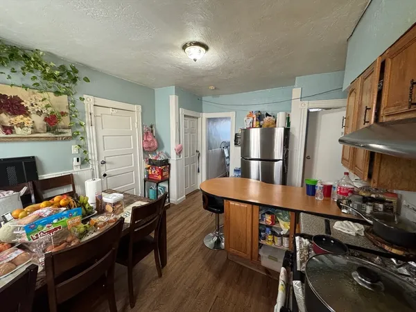 a room with furniture and a wooden floor