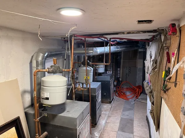 a room with wooden furniture and storage