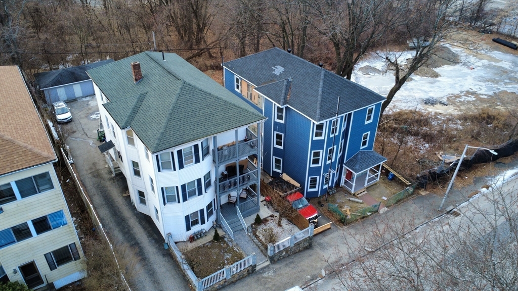 27 Harlow Street Worcester, MA 01605 - Photo 32 of 32 a view of balcony with wooden floor and fence