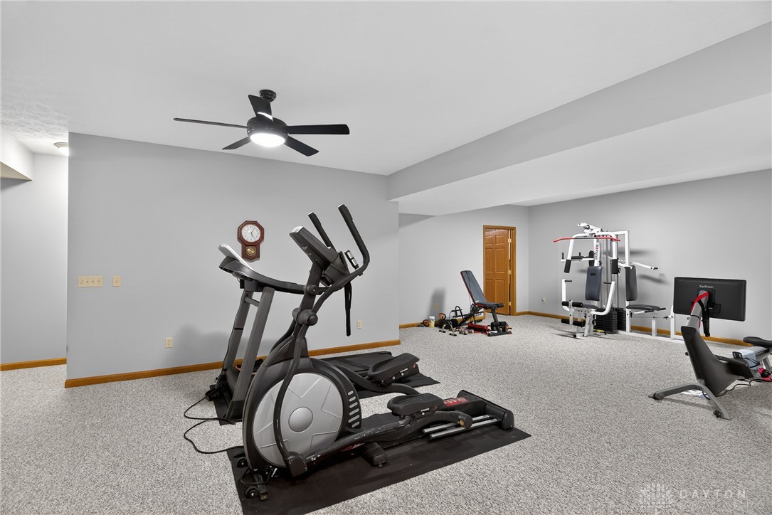 5264 Frazier-Guy Road Sidney, OH 45365 - Photo 35 of 51 This spacious exercise room features a ceiling fan, perfect for workouts.