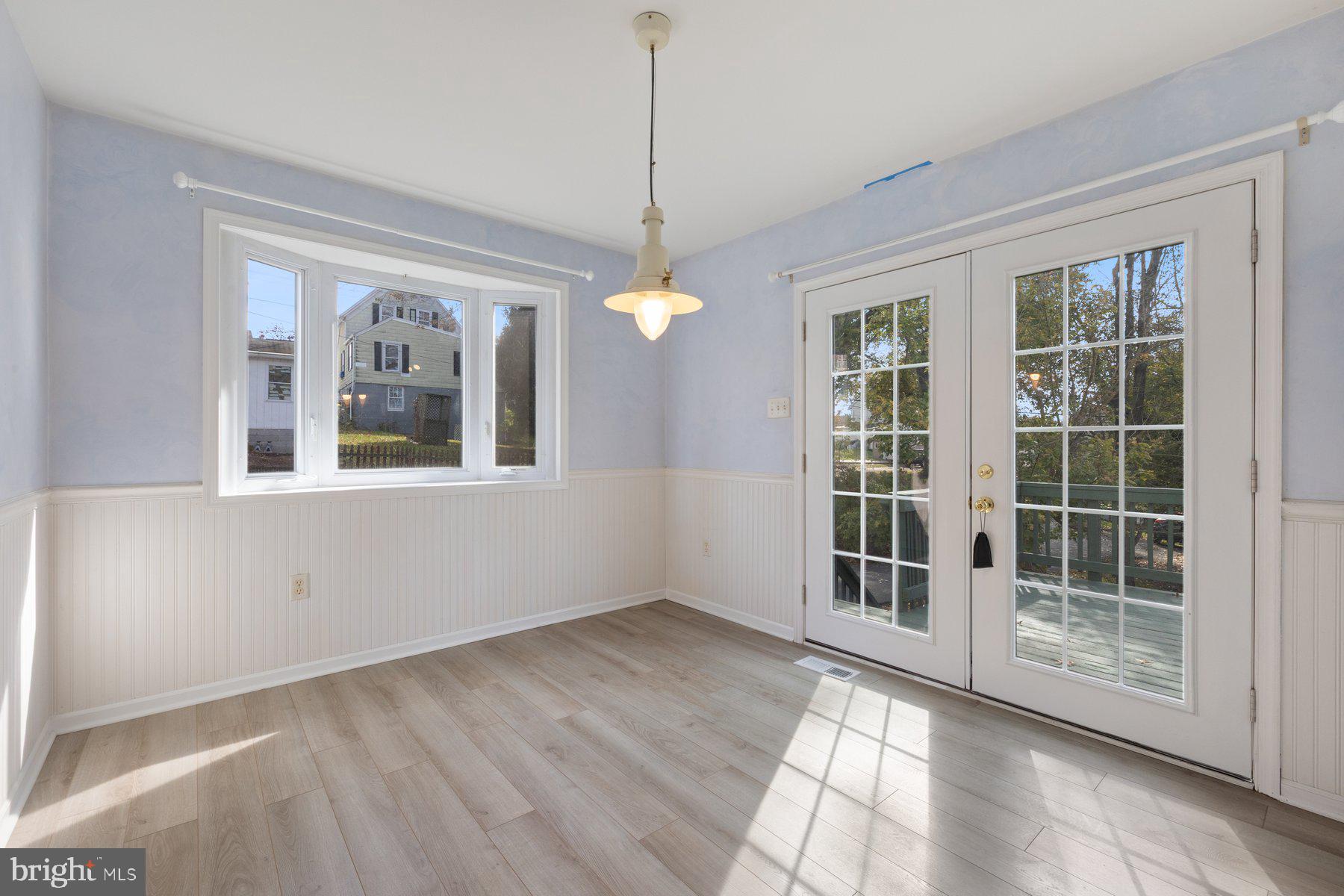 822 East B Street Brunswick, MD 21716 - Photo 15 of 42 a view of empty room with windows