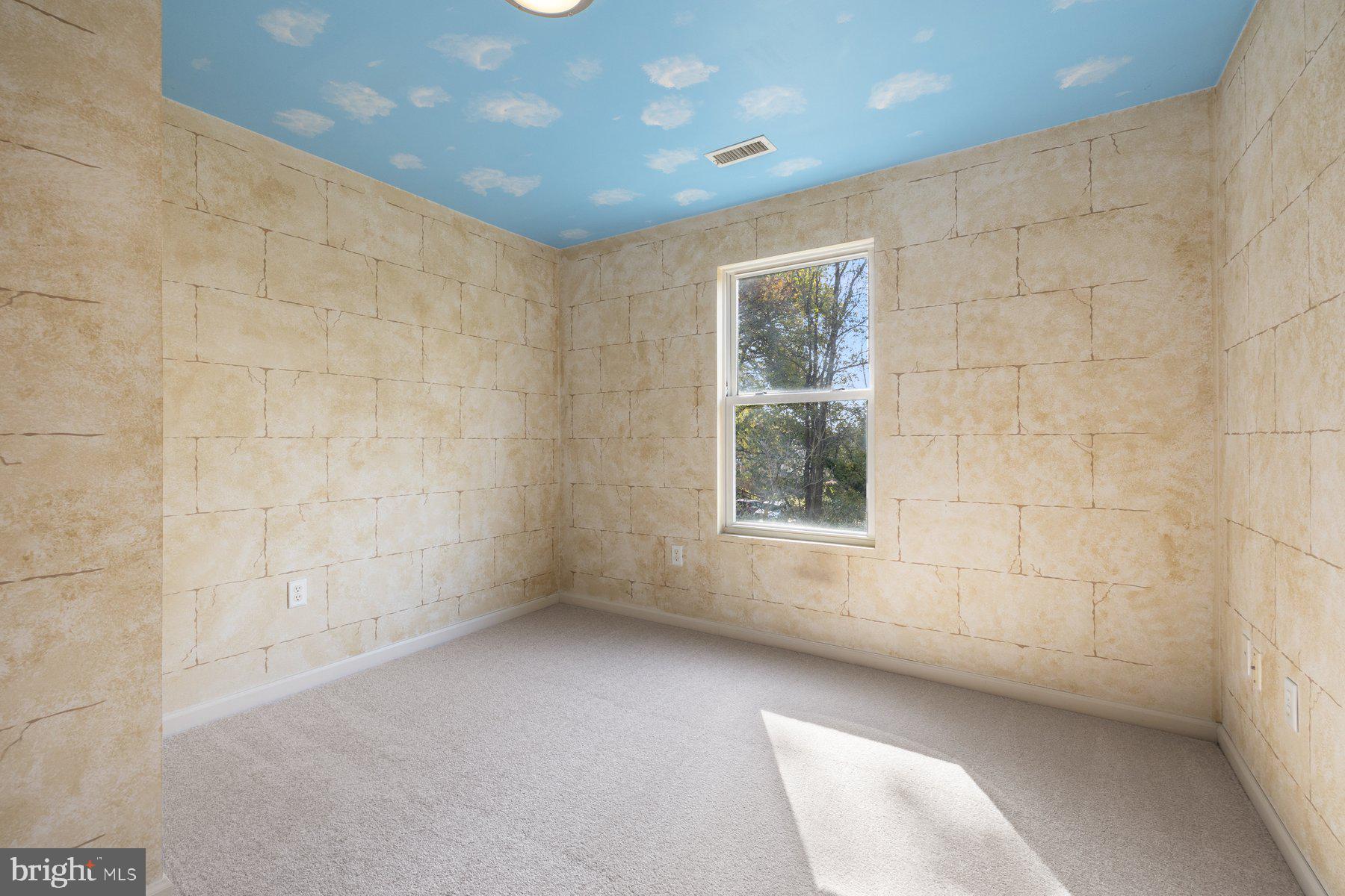 822 East B Street Brunswick, MD 21716 - Photo 22 of 42 a view of an empty room with a window