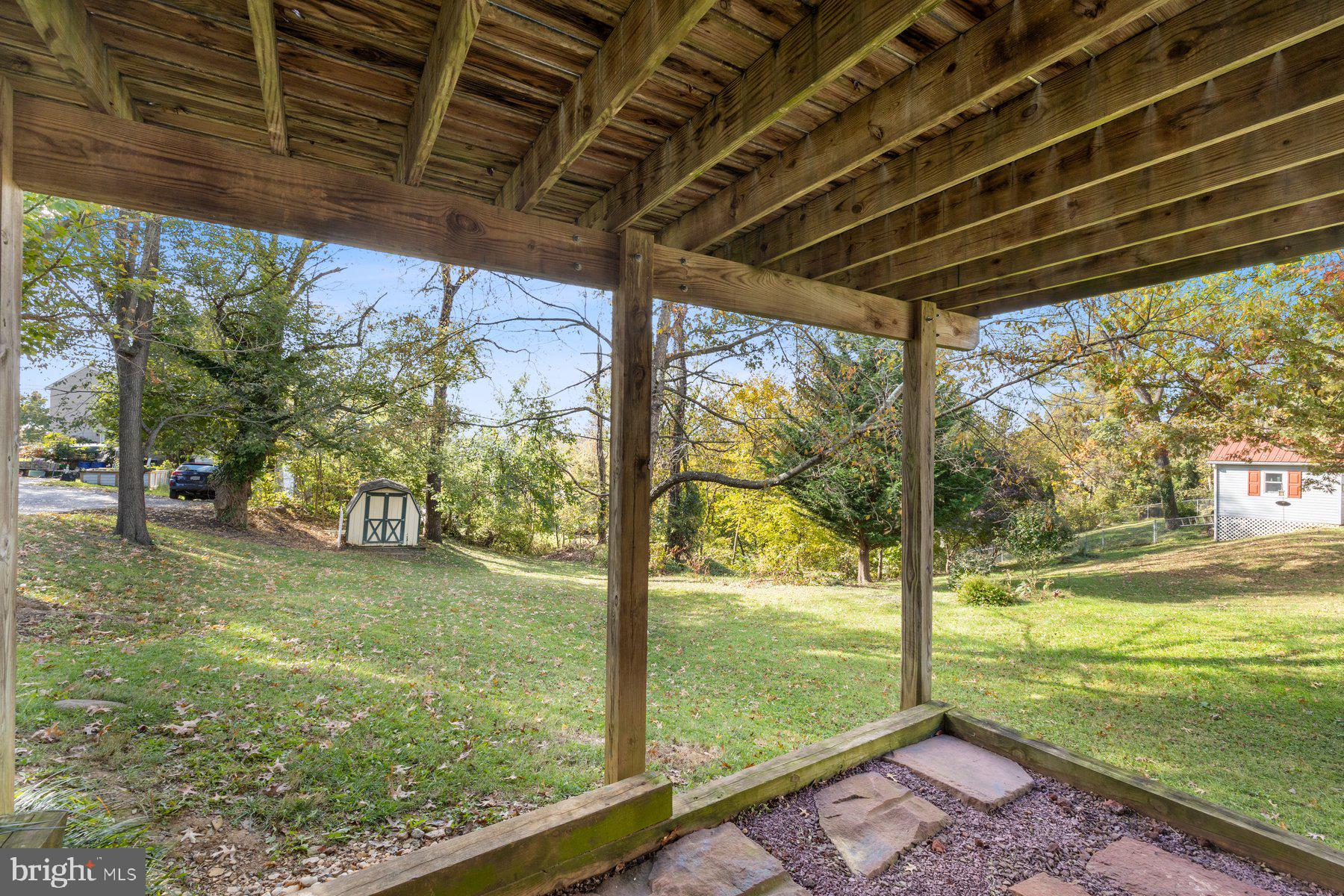 822 East B Street Brunswick, MD 21716 - Photo 5 of 42 a view of a yard with an outdoor space