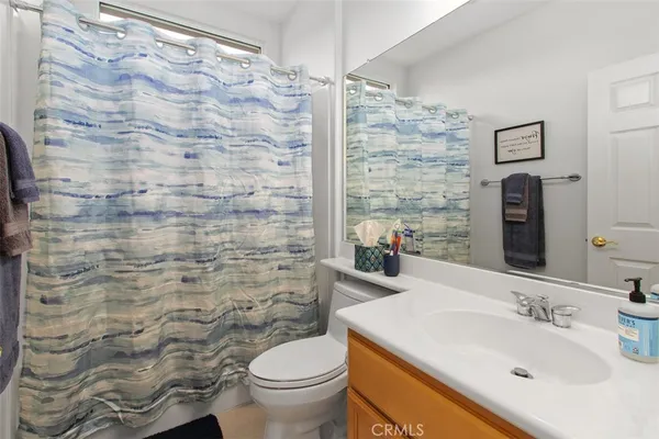 a living room with patio furniture