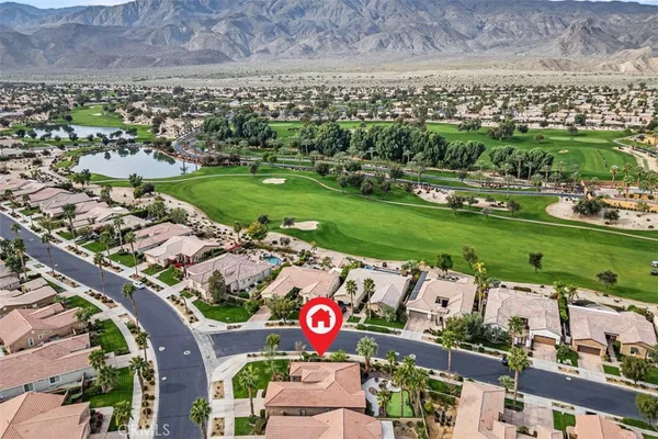 a view of a city with mountains in the background