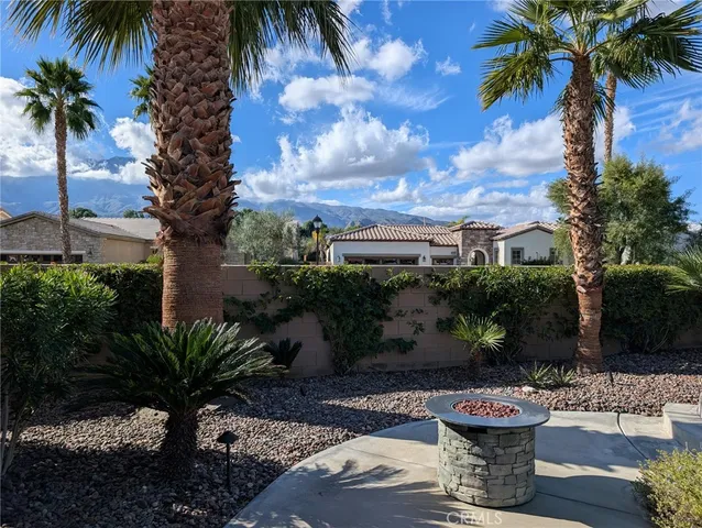 a view of a table and chairs in patio