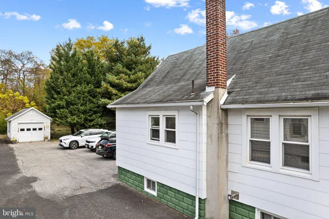 a car parked in front of a house