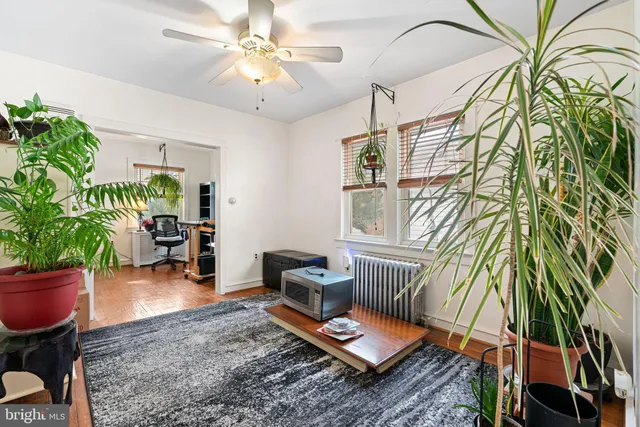 a living room with patio furniture