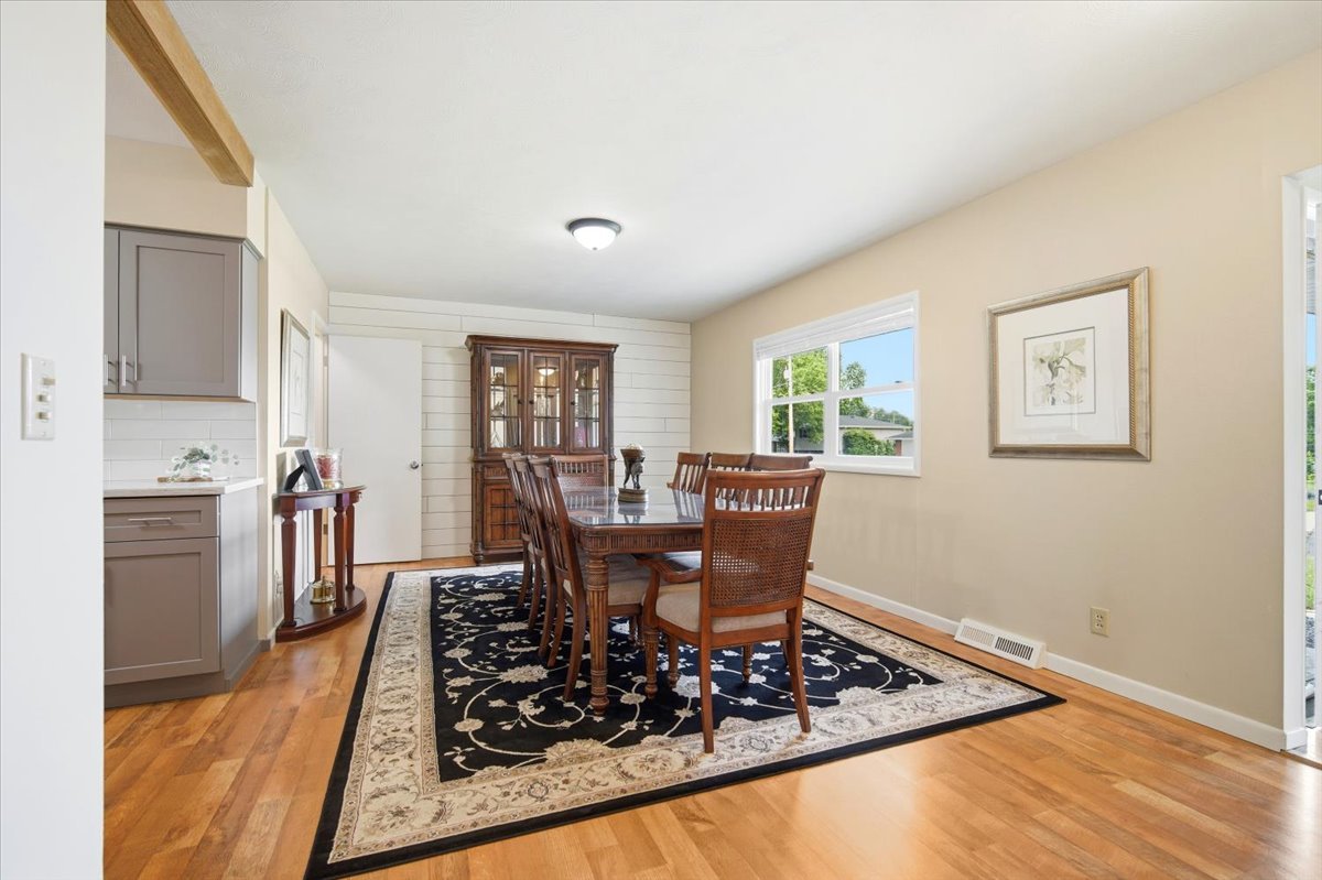 203 Highview Drive Eureka, IL 61530 - Photo 8 of 49 a view of a dining room with furniture window and wooden floor