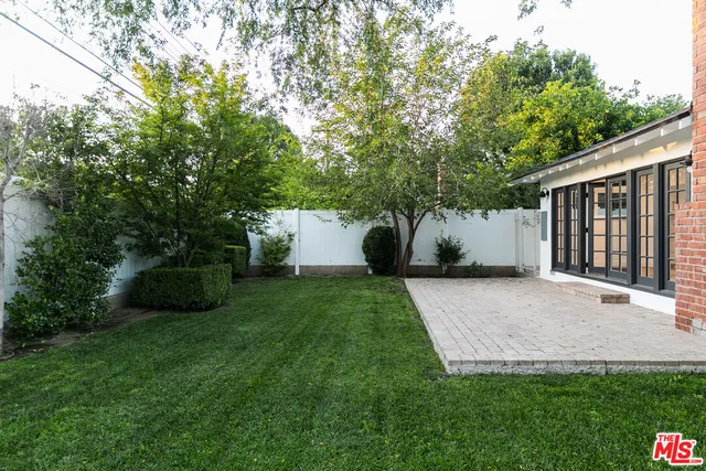 a view of a back yard of the house