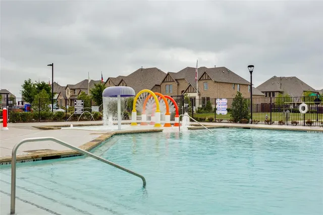 a view of a house with swimming pool