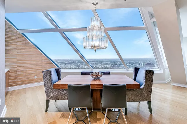 a view of an outside dining space with furniture