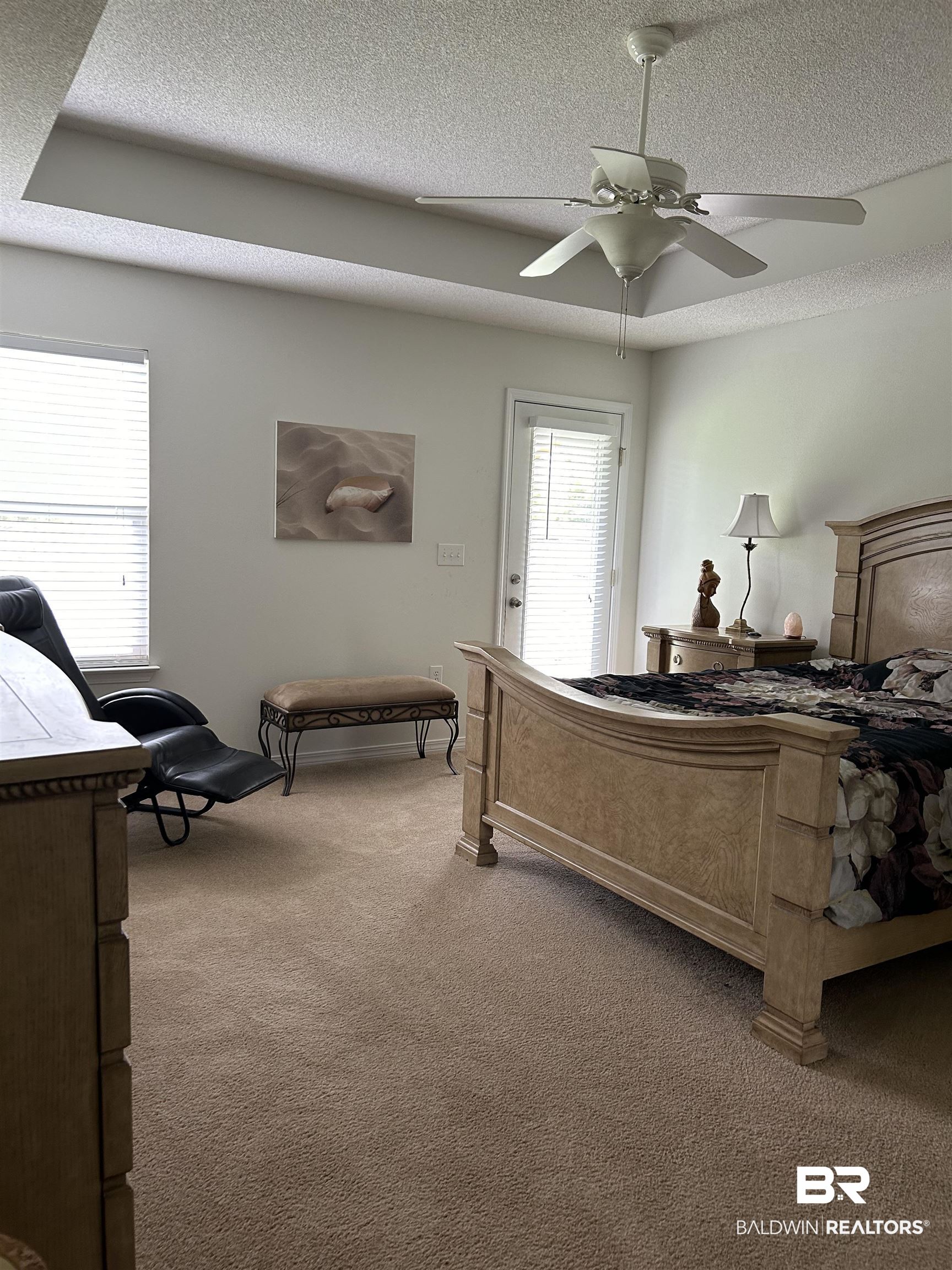16976 Sugar Loop Foley, AL 36535 - Photo 9 of 16 Carpeted bedroom featuring a textured ceiling and ceiling fan
