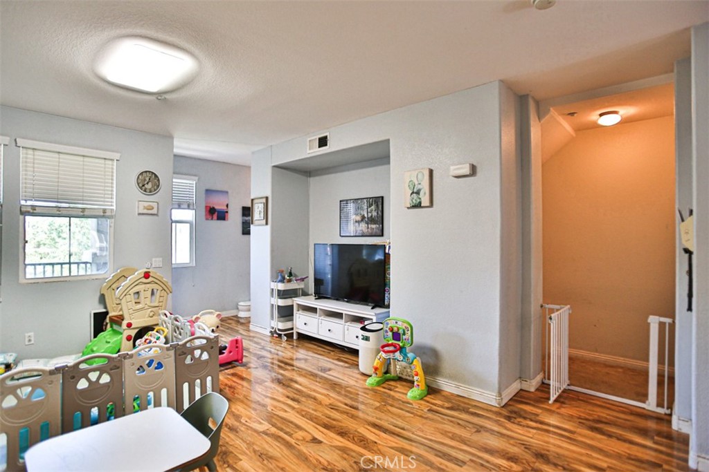 8796 Aspenglow Place, Unit 2 Santee, CA 92071 - Photo 26 of 41 a living room with furniture and a flat screen tv