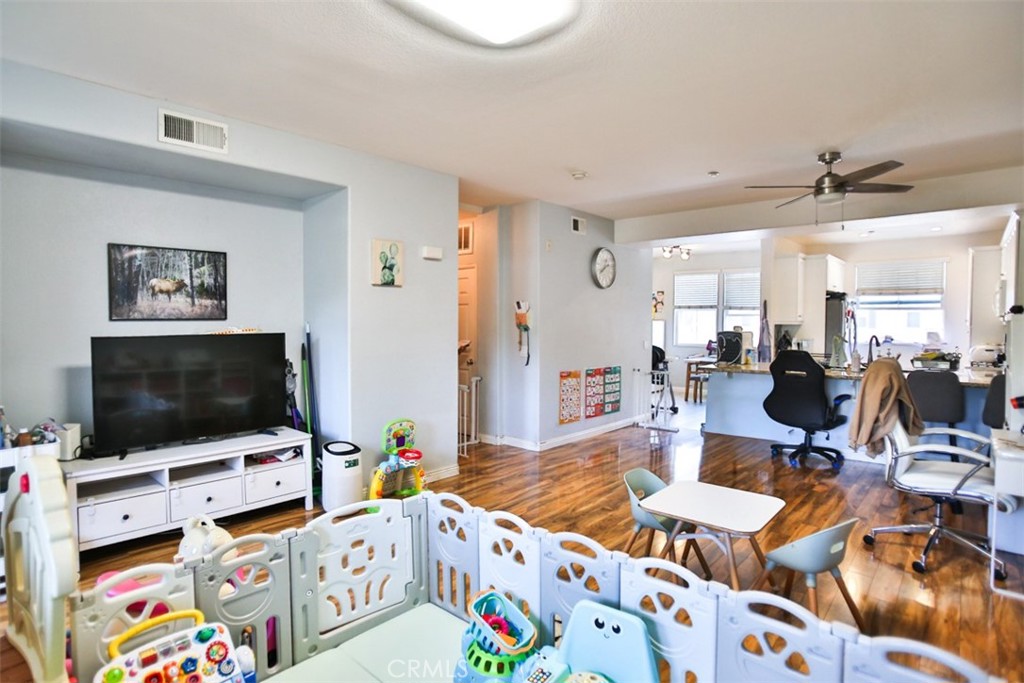 8796 Aspenglow Place, Unit 2 Santee, CA 92071 - Photo 27 of 41 a living room with furniture and a flat screen tv