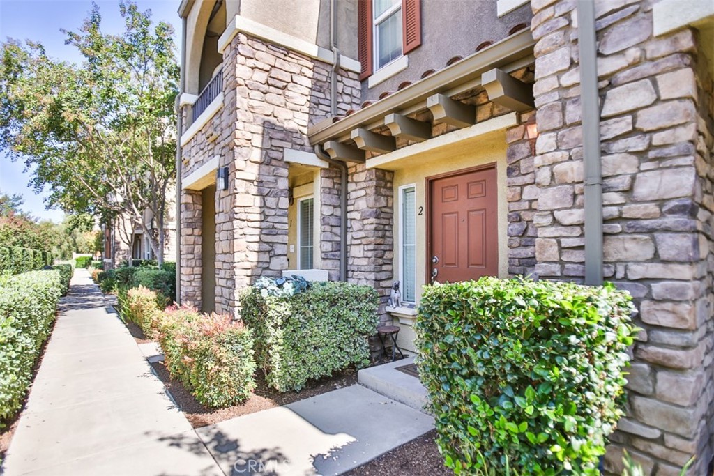 8796 Aspenglow Place, Unit 2 Santee, CA 92071 - Photo 3 of 41 a view of a building with potted plants