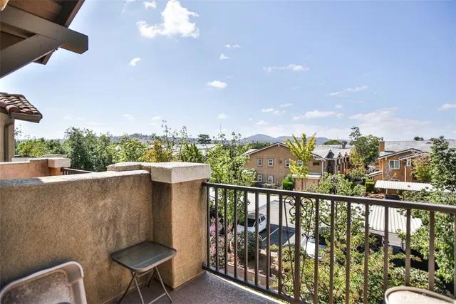 a view of a chairs in a balcony