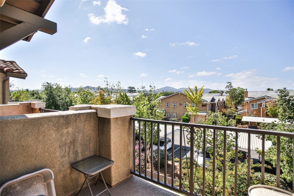 8796 Aspenglow Place, Unit 2 Santee, CA 92071 - Photo 40 of 41 a view of a chairs in a balcony