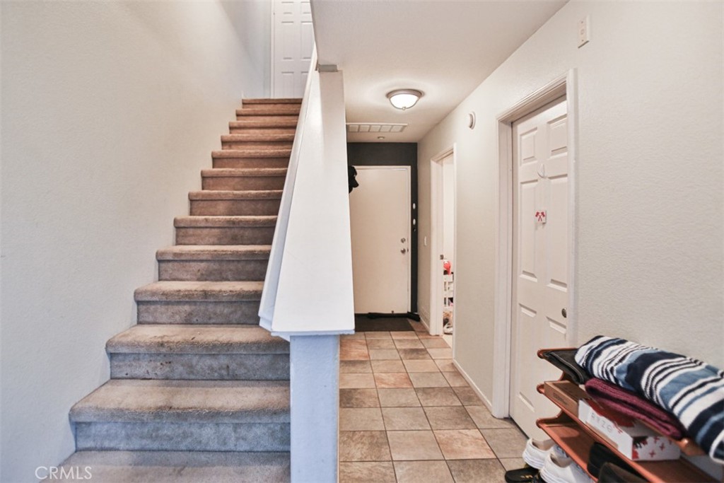 8796 Aspenglow Place, Unit 2 Santee, CA 92071 - Photo 10 of 41 a view of entryway and hall with wooden floor