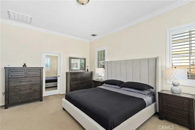 a bedroom with a bed and furniture