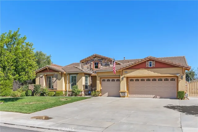 a view of a house with a street